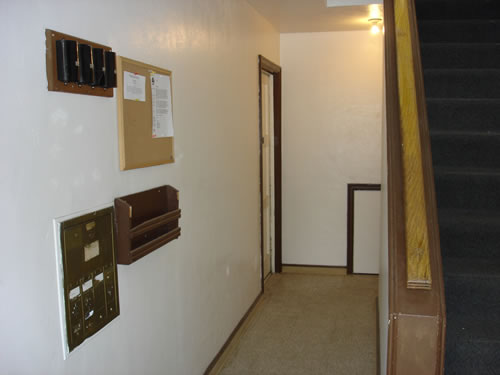 Interior entryway to all four apartments .